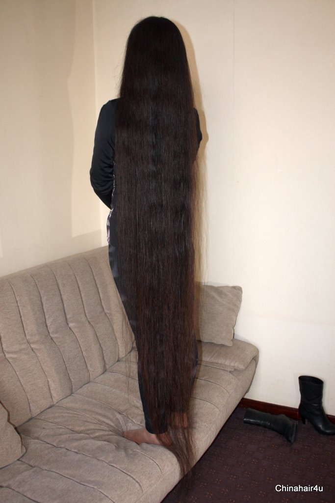 She is 30 and has floor length hair. 